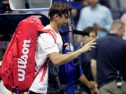   David Ferrer leaves Center injured after his last Grand Slam career: KEYSTONE / AP / JULIO CORTEZ 