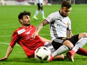 Der Winterthurer Torschütze Luca Radice (links), hier aus einem Spiel gegen Basel, gegen Renato Steffen (Bild: KEYSTONE/WALTER BIERI)