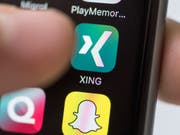 Auch Schweizer Unternehmen suchen Kandidaten vermehrt über das Karrierenetzwerk Xing. (Bild: KEYSTONE/CHRISTIAN BEUTLER)
