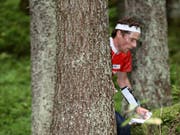 Daniel Hubmann kämpft sich durch unwegsames Gelände (Bild: KEYSTONE/ORIENTEERING WORLD CUP FINAL/REMY STEINEGGER)