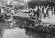 Die Flutwelle zerstörte die Ufermauer von Weggis. Bild: Verein historisches Archiv Weggis