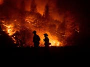 Die Feuerwehr hat bei der Bekämpfung des Grosswaldbrandes «Mendocino Complex Fire» in Nordkalifornien Fortschritte gemacht. (Bild: KEYSTONE/FR34727 AP/NOAH BERGER)