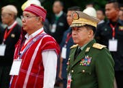 General Min Aung Hlaing (rechts) und Mahn Win Khaing Than, Sprecher des Oberhauses, während einer Zeremonie. (Bild: Lynn Bo Bo/Epa (Myanmar, 19. Juli 2018))