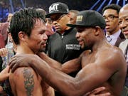 Floyd Mayweather (rechts) will nochmals gegen Manny Pacquiao boxen (Bild: KEYSTONE/FR159466 AP/ISAAC BREKKEN)