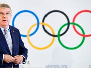 Das IOC (links im Bild Präsident Thomas Bach) wird vorderhand keine Bewerbung aus Italien für Winterspiele erhalten (Bild: KEYSTONE/VALENTIN FLAURAUD)