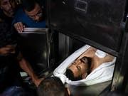   Palestinians A victim killed by Israeli soldiers at the Gaza border fence. (Photo: Keystone / AP / Felipe Dana) 