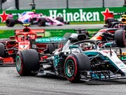 Lewis Hamilton siegt im Ferrari vor Kimi Räikkönen im Ferrari (Bild: KEYSTONE/EPA/SRDJAN SUKI)