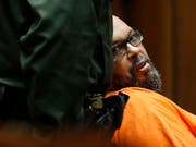   Two people caught in a car park: American hiphop producer Suge Knight. (Photo: KEYSTONE / AP Pool Los Angeles Times / GARY CORONADO) 