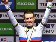 Strahlt im regenbogenfarbenen Trikot des Zeitfahr-Weltmeisters: Der Australier Rohan Dennis (Bild: KEYSTONE/AP/KERSTIN JOENSSON)