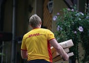   DHL Packaging Service in the German City of Herten. (Image: Oliver Berg / Keystone (10 July 2018)) 