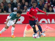 Jonathan Bamba steuert eine Doublette zu Lilles Sieg im Verfolgerduell gegen Marseille bei (Bild: KEYSTONE/AP/MICHEL SPINGLER)