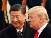 Chinas Präsident Xi Jinping hat US-Präsident Donald Trump am Dienstag eine versöhnliche Hand gereicht und die Vorzüge von Zusammenarbeit gelobt. (Bild: KEYSTONE/AP/ANDREW HARNIK)