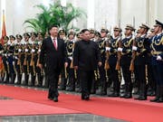Chinas Präsident Xi Jinping (links) und Nordkoreas Diktator Kim Jong Un (rechts) haben sich nach ihren jüngsten Treffen in Peking positiv über eine Wiedervereinigung der beiden Koreas geäussert. (Bild: KEYSTONE/AP Xinhua/SHEN HONG)