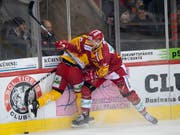 Die SCL Tigers, hier mit Eero Elo im roten Trikot, hatten den EHC Biel vor allem im Mitteldrittel im Griff (Bild: KEYSTONE/ANTHONY ANEX)