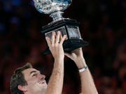 Start zur Titelverteidigung in einer Night-Session: Roger Federer am Australian Open (Bild: KEYSTONE/AP/VINCENT THIAN)
