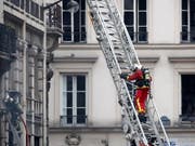 Die Explosion in der Pariser Innenstadt hat vier Todesopfer gefordert. (Bild: KEYSTONE/EPA/IAN LANGSDON)