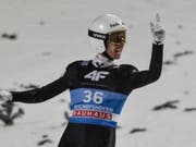Simon Ammann hatte allen Grund zur Freude (Bild: KEYSTONE/EPA/ANGELIKA WARMUTH)