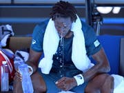 Neue Regeln bei extremer Hitze: Am Australian Open kommt eine neue «Hitzestress-Skala» zum Einsatz. Wird ein bestimmter Wert überschritten, können Spiele unterbrochen werden. (im Bild Gaël Monfils) (Bild: KEYSTONE/EPA AAP/DEAN LEWINS)