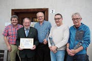 Von links: Präsident Rolf Wipfli mit den Geehrten, Josef Arnold (50 Jahre) sowie Peter Wipfli, Robi Wipfli und Toni Gisler (je 30 Jahre). (Bild: fi (Seedorf, 13. Januar 2019))