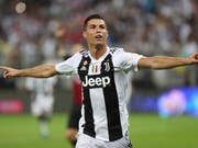 Cristiano Ronaldo zeigt eine gemässigte Freude nach seinem Siegestor gegen Milan (Bild: KEYSTONE/AP)
