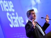 Markus Söder ist der neunte Parteichef in der Geschichte der CSU. Der Sonderparteitag wählte ihn am Samstag mit 87,4 Prozent der Stimmen zum Nachfolger von Horst Seehofer. (Bild: KEYSTONE/EPA/PHILIPP GUELLAND)