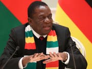 Simbabwes Präsident Mnangagwa lässt sich am Weltwirtschaftsforum in Davos von Finanzminister Mthuli Ncube vertreten. (Bild: KEYSTONE/AP POOL TASS News Agency/NATALIA FEDOSENKO)