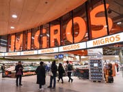 Migros und Coop gehören auch weltweit zu den Giganten. (Bild: KEYSTONE/MELANIE DUCHENE)