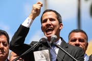 In der Hauptstadt Caracas liess sich Parlamentspräsident Juan Gaidó vom Volk als Interimspräsident vereidigen. (Bild: Keystone/EPA/Cristian Hernandez, 23. Januar 2019)