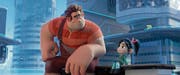 Ralph und seine neue beste Freundin Vanellope suchen Lenkradersatz für die Rennspielheldin. Wo? Im Internet! (Bild: Disney)