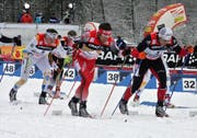 Tour-Leader Christoph Eigenmann 2007 zwischen Bjoern Lind (SWE) und Roddy Darragon (FRA). (Bild: Urs Huwyler)