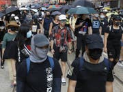 Demonstranten aus Hongkong. (Bild: Keystone)