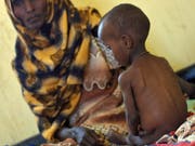 Die Zahl der weltweit hungernden Menschen ist von 785 Millionen im Jahr 2015 auf derzeit 822 Millionen gestiegen. (Bild: KEYSTONE/AP AFP POOL/TONY KARUMBA)
