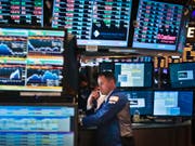 Ein Händler bei der Arbeit an der Börse in New York. (Bild: KEYSTONE/AP/Bebeto Matthews)