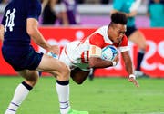 Der Japaner Kotaro Matsushima (rechts) legte bereits fünf Versuche an dieser WM. Er führt diese Statistik damit gemeinsam mit dem Waliser Josh Adams an.(Bild: The Yomiuri Shimbun via AP Images ) (KEYSTONE/AP Yomiuri Shimbun/Koji Ito)