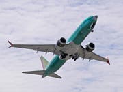 Eine Maschine des Typs 737 MAX 8 des US-Flugzeugherstellers Boeing bei einem Testflug bei Renton im Bundesstaat Washington. (Bild: KEYSTONE/AP/TED S. WARREN)