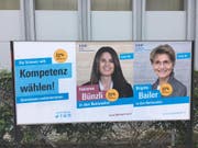 Orange «Klima-Kleber» auf einem FDP-Plakat. (Bild: PD)