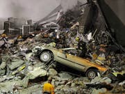 Rettungskräfte auf der Suche nach Überlebenden nach dem Erdbeben in Christchurch im Februar 2011. (Bild: Keystone/AP Kyodo News/SHUZO SHIKANO)