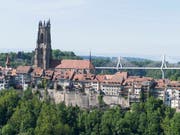 In einer Freiburger Kirche haben zwei Männer versucht, eine Kasse aufzubrechen. (Bild: KEYSTONE/THOMAS DELLEY)