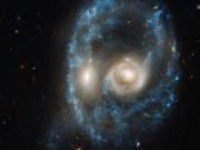 Zwei Galaxien, die kollidieren, bilden dieses kosmische Gesicht. (Bild: NASA)