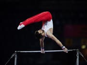 Oliver Hegi vermochte im Team-Final am Reck zu glänzen (Bild: KEYSTONE/EPA/RONALD WITTEK)
