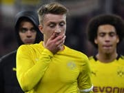 Marco Reus hat bereits seit längerem Schmerzen am Sprunggelenk. Am Samstag bei der 0:4-Niederlage in München wurde der BVB-Captain dennoch in der 61. Minute für Mario Götze eingewechselt (Bild: KEYSTONE/EPA/PHILIPP GUELLAND)