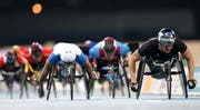 Marcel Hug (rechts) gewann die Silbermedaille. (Bild: EPA)