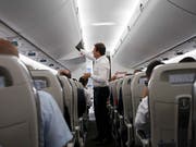 Endlich Schluss mit dem Gerangel beim Einsteigen? Die Lufthansa hofft, mit einem neuen Einsteigeverfahren das Boarding verkürzen zu können. (Bild: KEYSTONE/SALVATORE DI NOLFI)