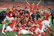 Das legendäre Jubelbild: Die Schweizer U17 in Ekstase nach dem Sieg im WM-Final 2009. (Bild: Pius Utomi Ekpei/AFP (Abuja, 15. November 2009))