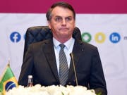 Brasiliens Parlament hat am Mittwoch die Reform des Waffenrechts abgeschwächt und damit dem Präsidenten des Landes, Jair Bolsonaro, erneut einen Dämpfer bei seinem Wahlkampfversprechen versetzt. (Bild: KEYSTONE/EPA/STR)