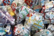 Der Recycling-Sack im Einsatz. (Bild: Verein IG Recycling-Sack)