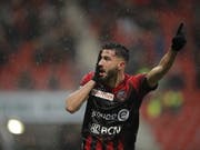 Max Veloso freut sich im Regen von Neuenburg über das 2:0 (Bild: KEYSTONE/VALENTIN FLAURAUD)