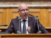 Fabio Regazzi (CVP/TI) möchte, dass Terroristen ausgeschafft werden - auch dann, wenn ihnen Folter droht. (Bild: KEYSTONE/ANTHONY ANEX)