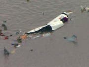 In den USA ist am Samstag eine Transportmaschine in eine Bucht gestürzt. (Bild: KEYSTONE/AP KRIV FOX 26)