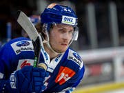 Pius Suter schiesst die ZSC Lions per Penalty zum wichtigen Sieg über die SCL Tigers (Bild: KEYSTONE/PATRICK B. KRAEMER)